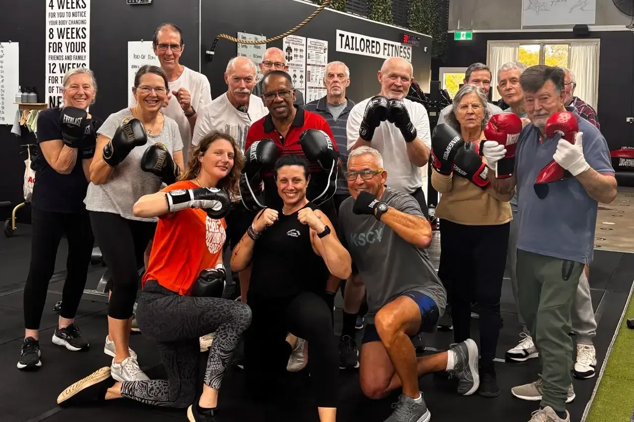Fight Back PD members and coaches together after a boxing session