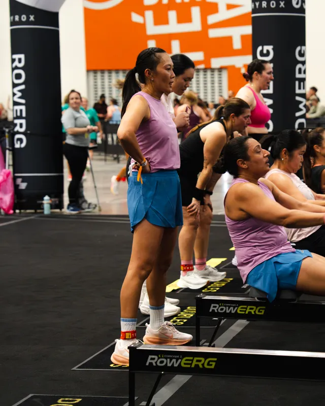 Competitors on the RowErg at a HYROX Perth event